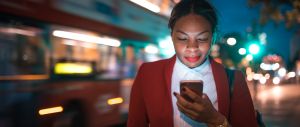 Businesswoman holding mobile phone