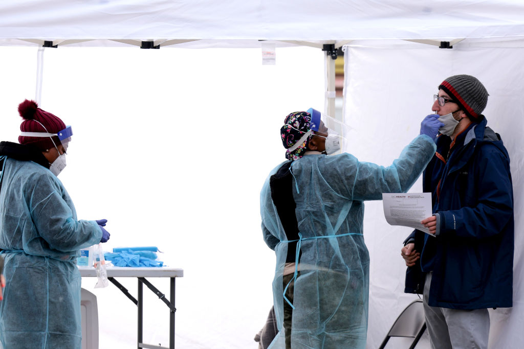 CDC Cuts Isolation Guidelines As Covid Cases Soar
