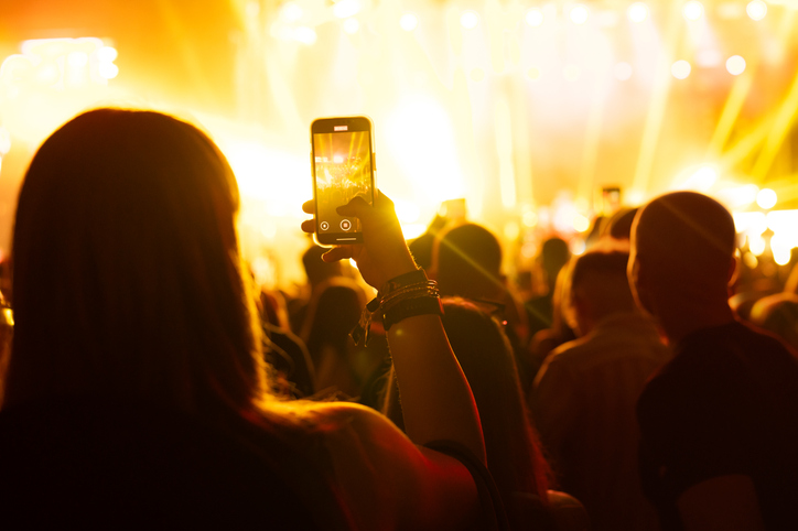 Silhouettes of the audience on the night concert